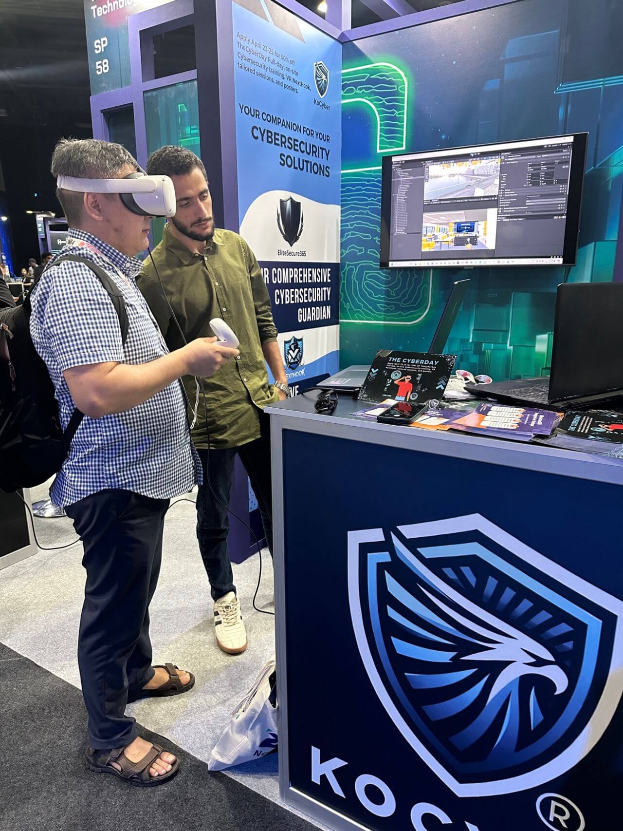 Visitor playing the Meta Quest cybersecurity game at the booth